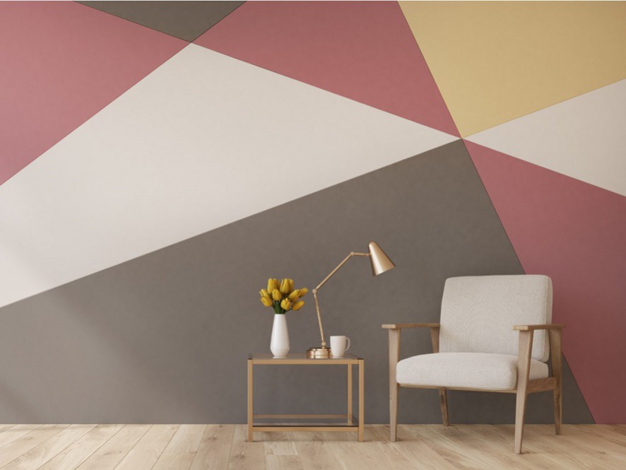 Geometric_print_hallway_soft_pinks_yellows_neutrals_light_timber_floor_table_white_chair_plant
